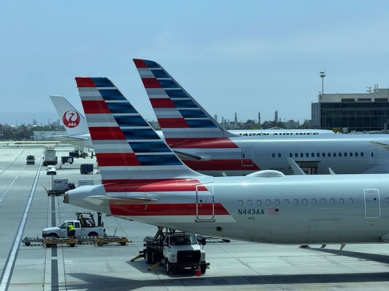 Laptop catches fire during American Airlines flight landing